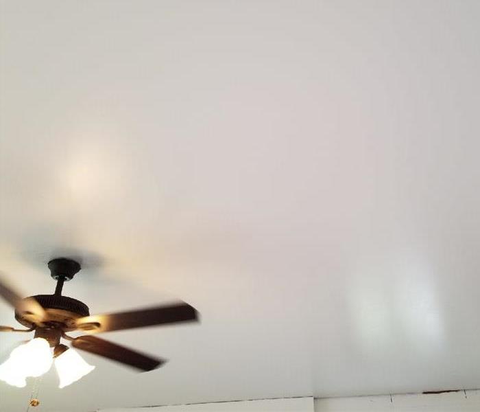 fresh white paint on smooth ceiling